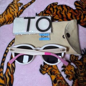 TOMS Round Sunglasses in Clear Frames with Purple Lenses and Pink Temples